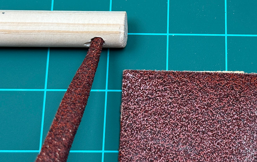 Sand the dowel
